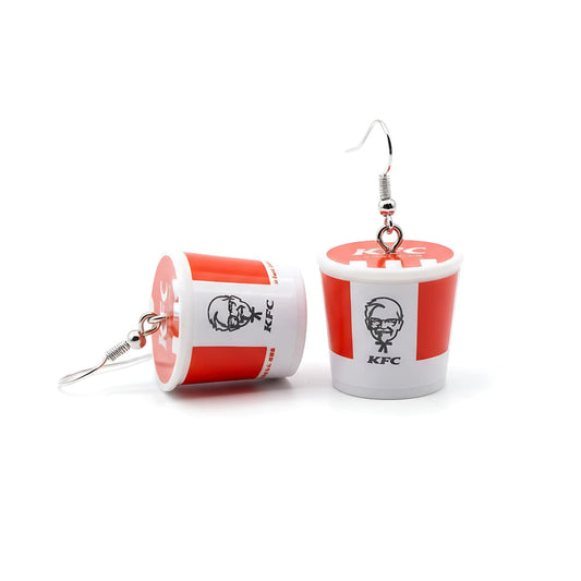 Pair of red-and-white chicken bucket dangle earrings on white background