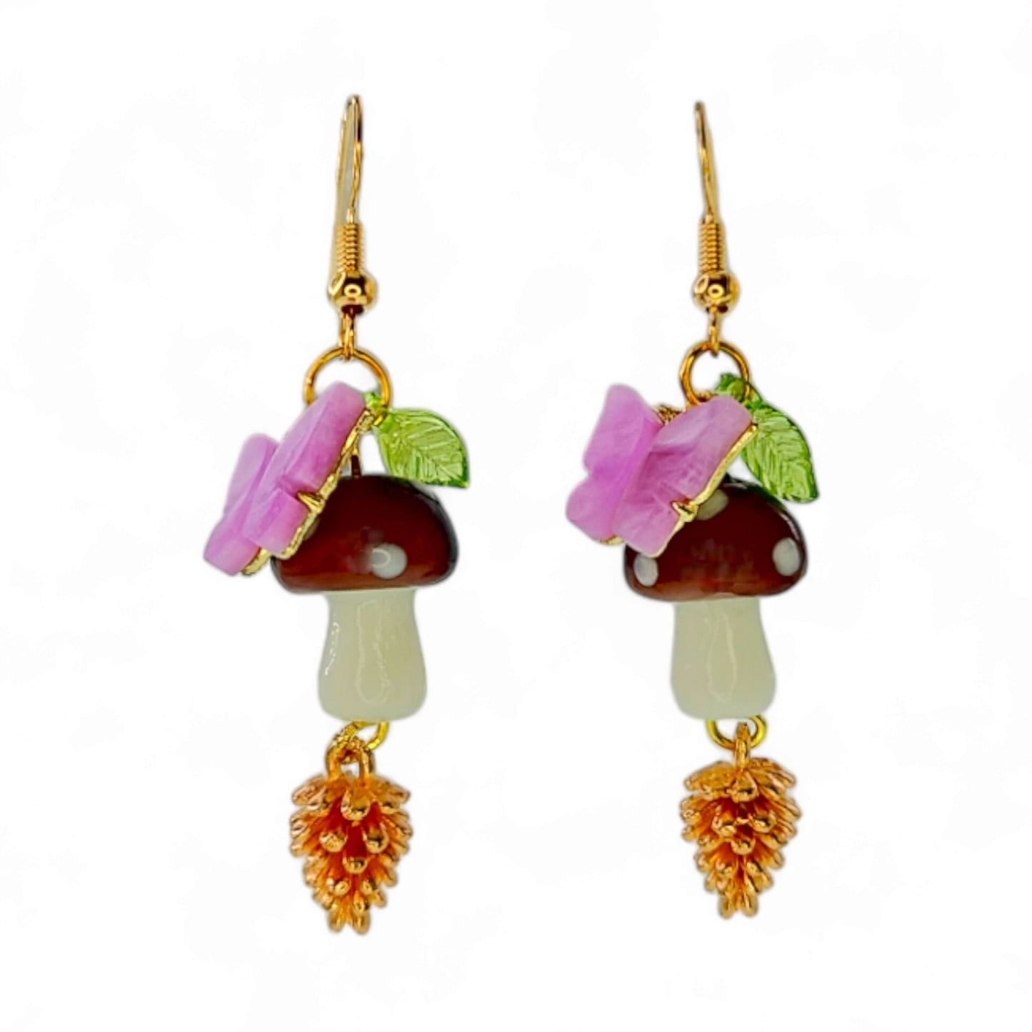Woodland Dreams Dangle Earrings featuring whimsical mushrooms, butterflies, leaves, and pinecones