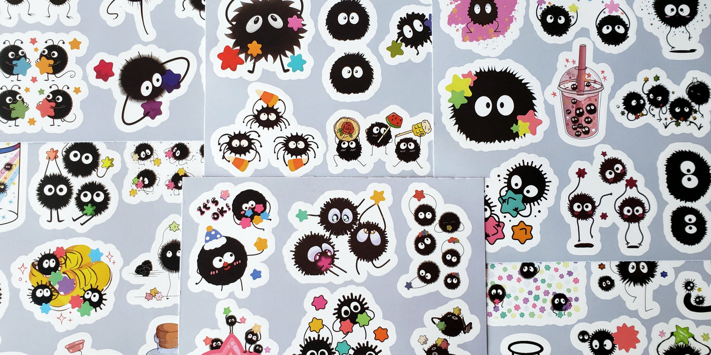 Flatlay showing all five Random Soot Sprite sticker sheets arranged side-by-side on a gray background