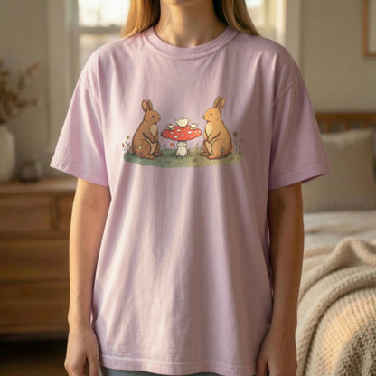 Bunny Picnic Tee worn standing on orchid shirt featuring soft illustrated rabbits enjoying a picnic