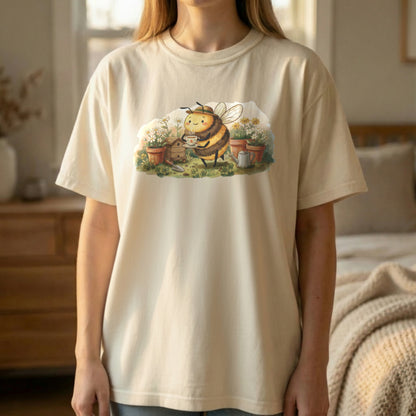Garden Bee Tee shown in standing lifestyle pose on ivory shirt