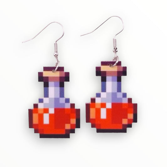 Pair of pixelated health potion bottle gaming earrings with red liquid for gamers