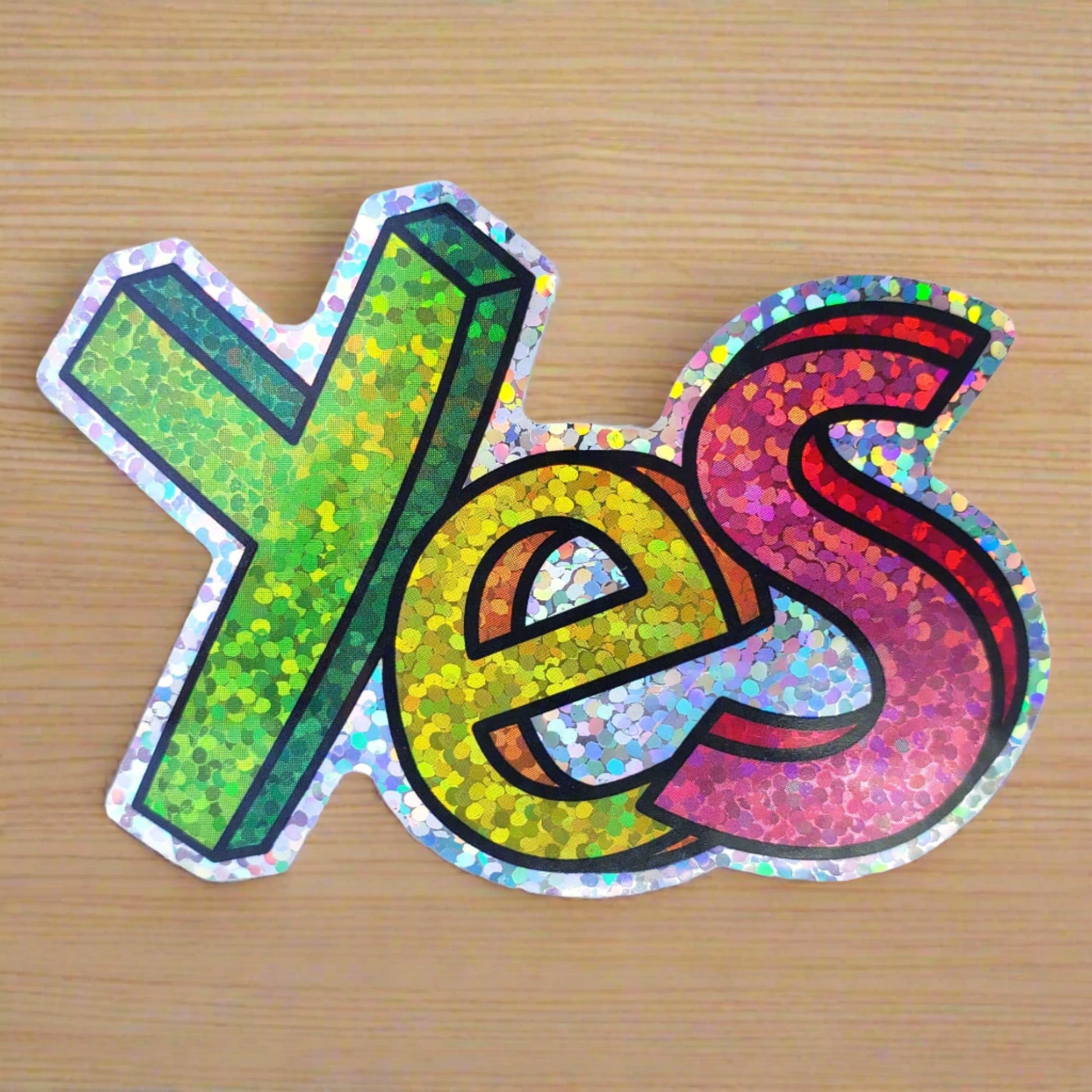 Holographic Rainbow ’Yes’ Sticker - Colorful, glittery adhesive with stylized lettering