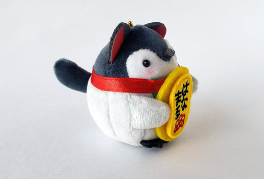 Side view of Lucky Penguin Plush Keychain hanging on silver ball-chain