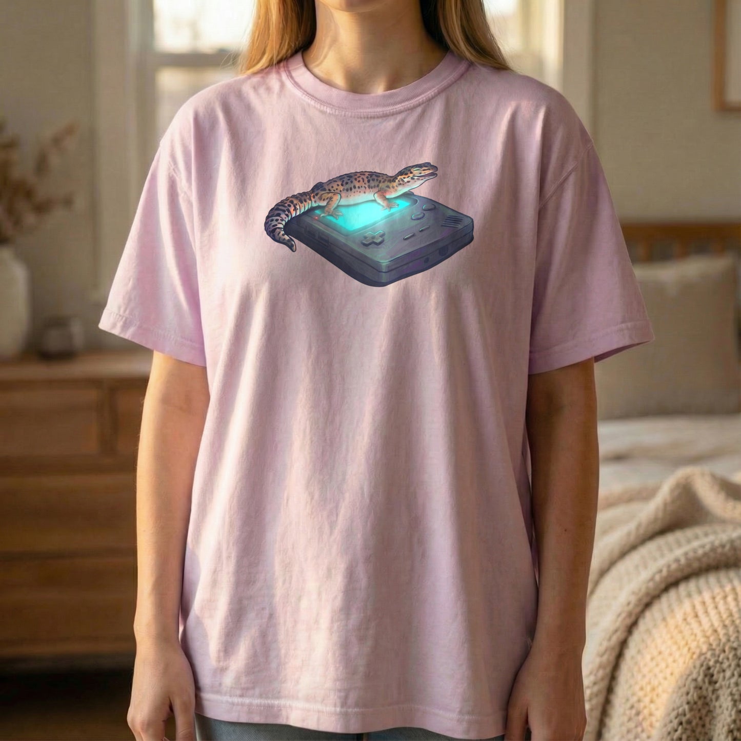 Retro Gecko graphic tee worn standing on orchid shirt with glowing retro console artwork