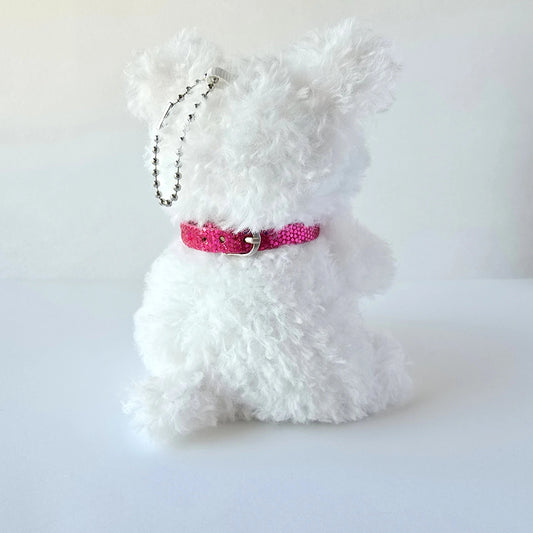 Back of plush keychain showing collar and chain attachment